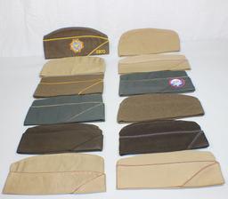 Lot of 12 US WW2 Overseas Garrison Caps. Some Khaki, some later, and some OD.