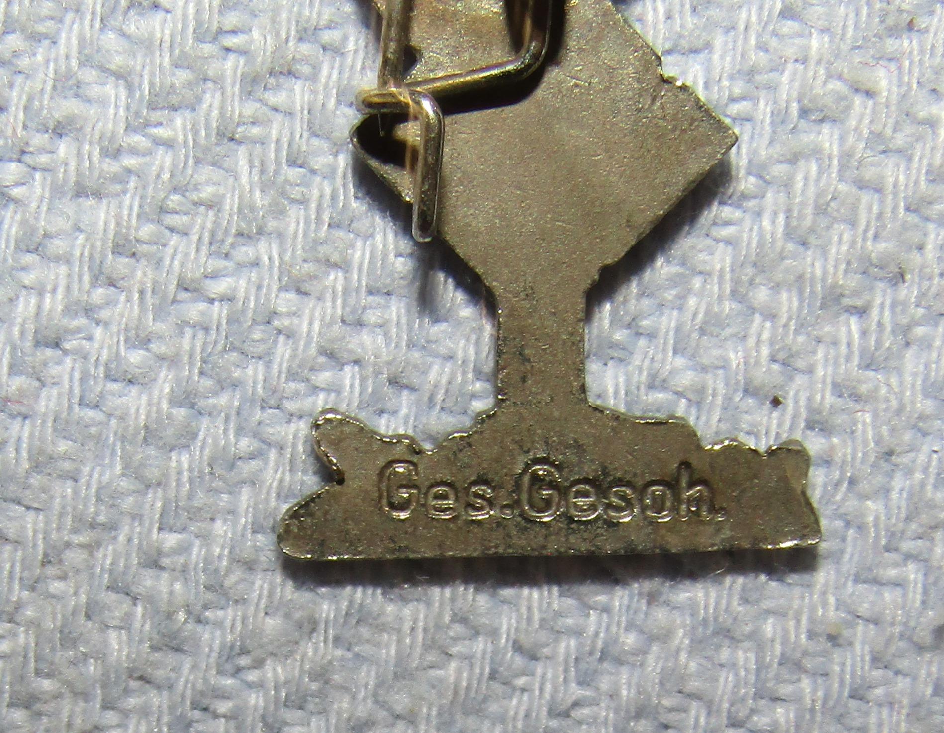 Enamel Afrika Korps Palm Tree Lapel Pin "Ges. Gesch."