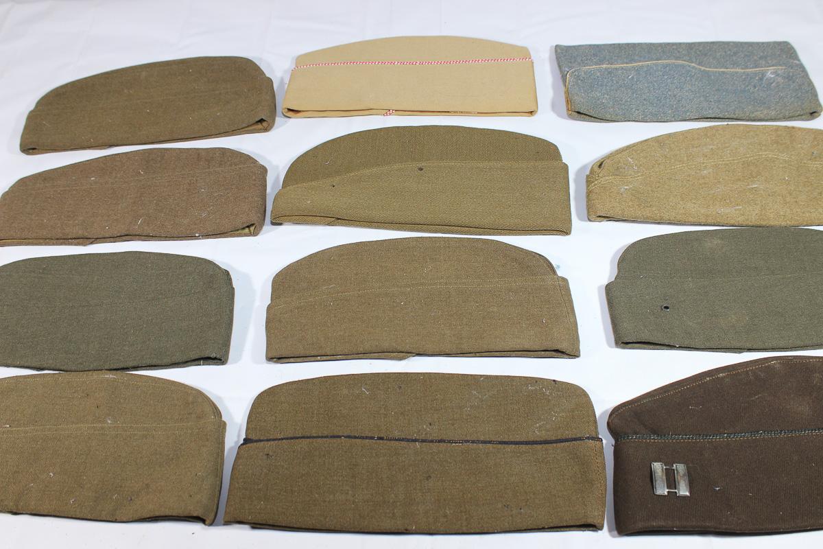 Lot of 12 US WW2 Overseas Garrison Caps. 1 French. 1 WW1 Cap. All Show Damage.