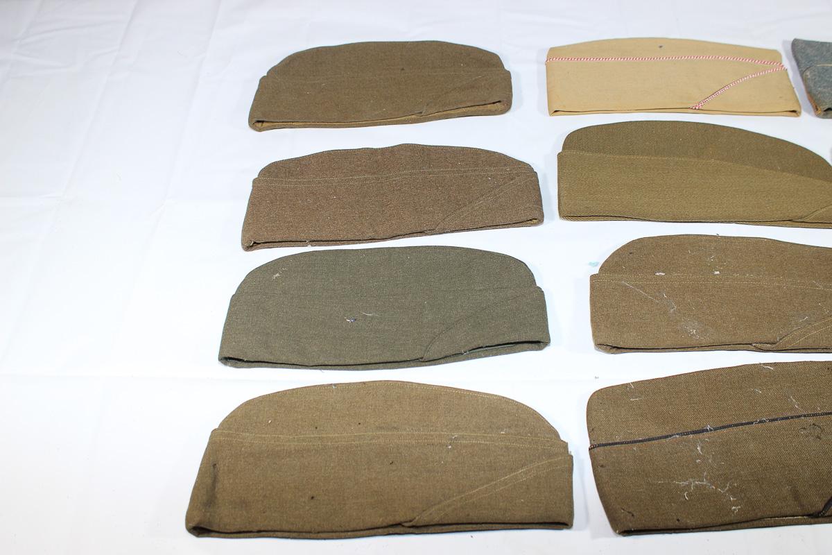 Lot of 12 US WW2 Overseas Garrison Caps. 1 French. 1 WW1 Cap. All Show Damage.