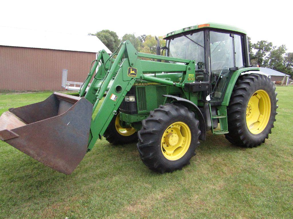 1997 John Deere Model 6400 MFWD Diesel tractor, Dual Door Cab, Air Seat, Fo