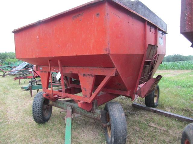 902. Unverferth Approx. 175 Bushel Gravity Box on John Deere 1065 Four Whee