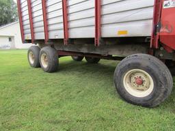 520. H&S Model 501 16 FT. Front Side Unload Forage Box on H&S 12 Ton Tandem