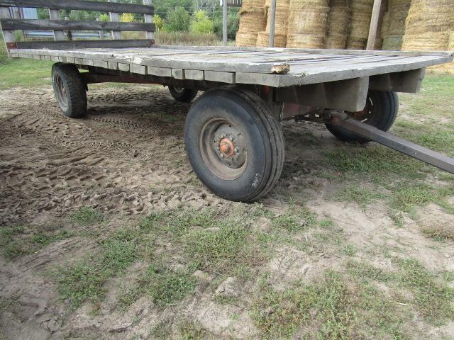 1661. 8 X 16 Wooden Flat Rack on MN 7 Ton Four Wheel Wagon