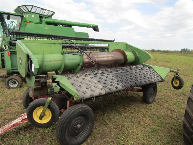 1702. John Deere 5 Belt Pickup Head ,Sells with Shop Built Four Wheel Heade