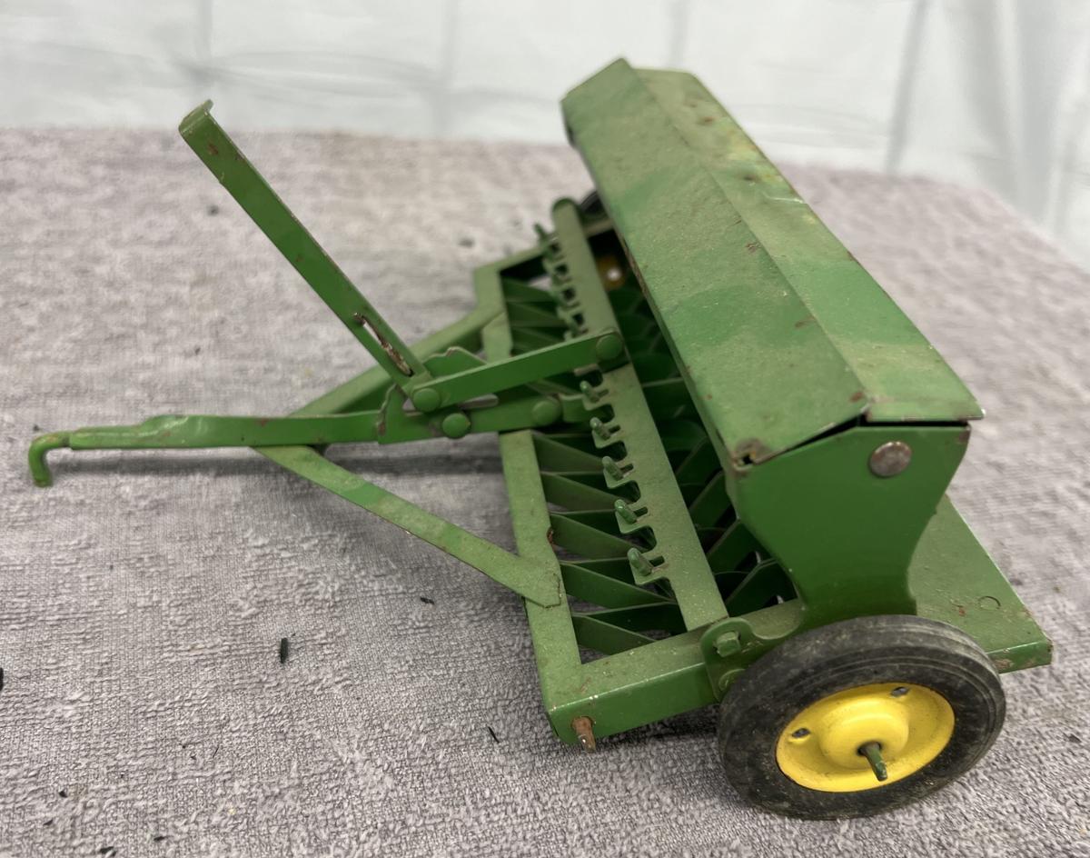 1/16 John Deere grain drill, pressed steal rims, no box