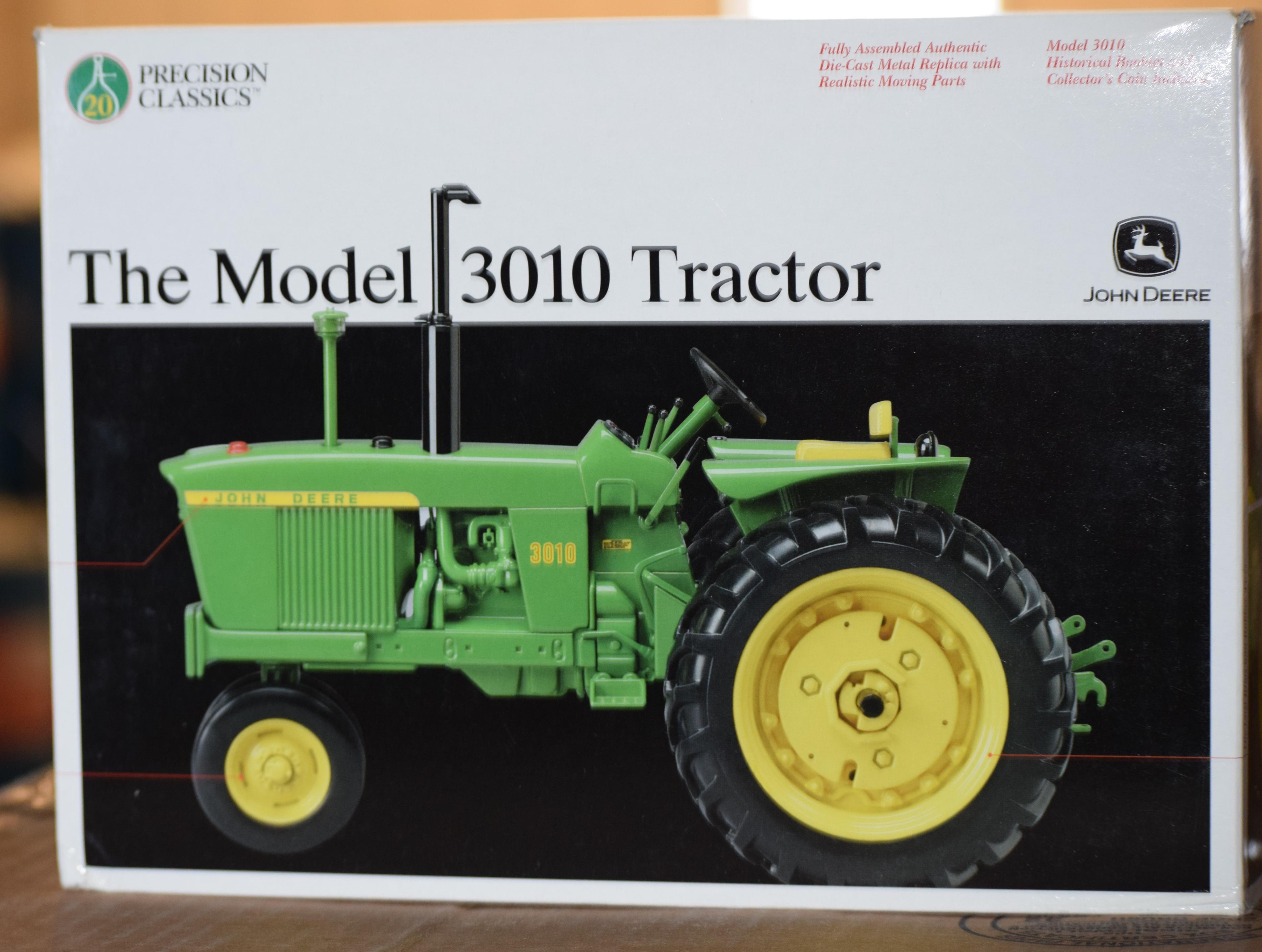 20.   221-403. 1/16 JD 3010 Tractor, Precision # 20, NIB, Tax