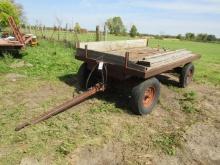 924. ELECTRIC FOUR WHEEL WAGON WITH 6 FT. X 10 FT. WOODEN FLAT BED AND HOIS