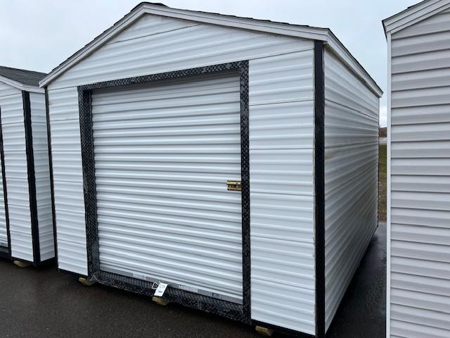 262. 10’ x 12’ Storage Shed, 6’ Rollup Door