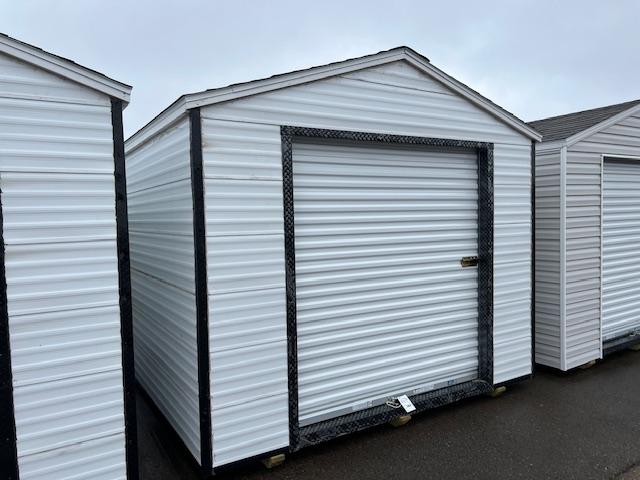 262. 10’ x 12’ Storage Shed, 6’ Rollup Door