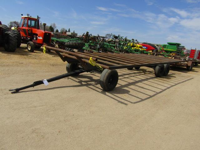 1600-A. 548-1446, NICE 10 FT X 24 FT. STEEL BALE RACK ON TANDEM AXLE WAGON,