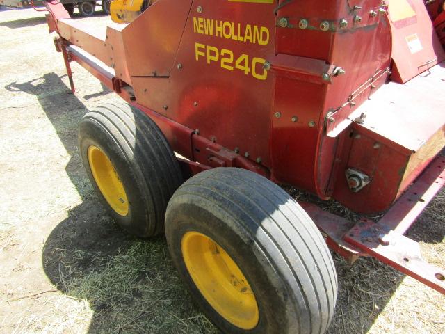 1634. 296-534, NEW HOLLAND MODEL FP 240 FORAGE HARVESTER, METALERT lll, 2 P