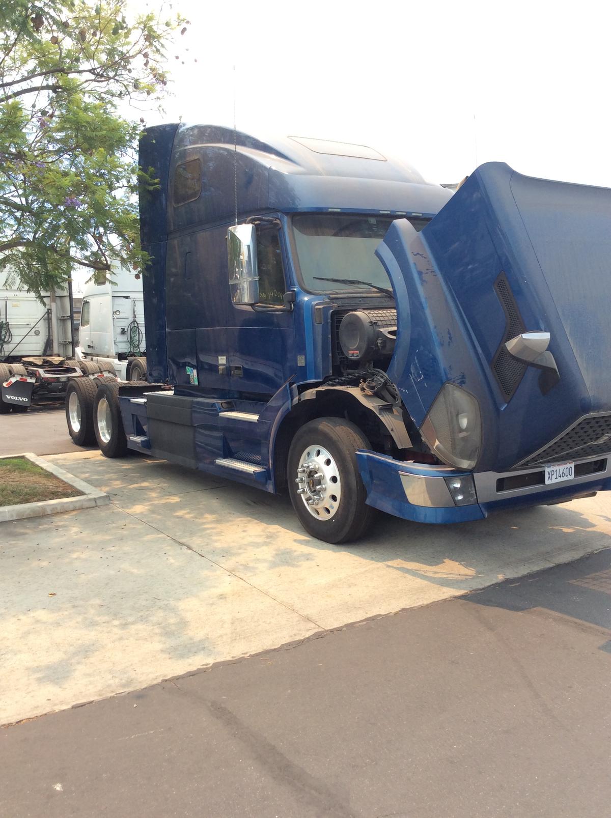 2015 Volvo VNL64T Tractor Truck, heavy duty, conventional cab, 6x4, 10 speed manual transmission, 12