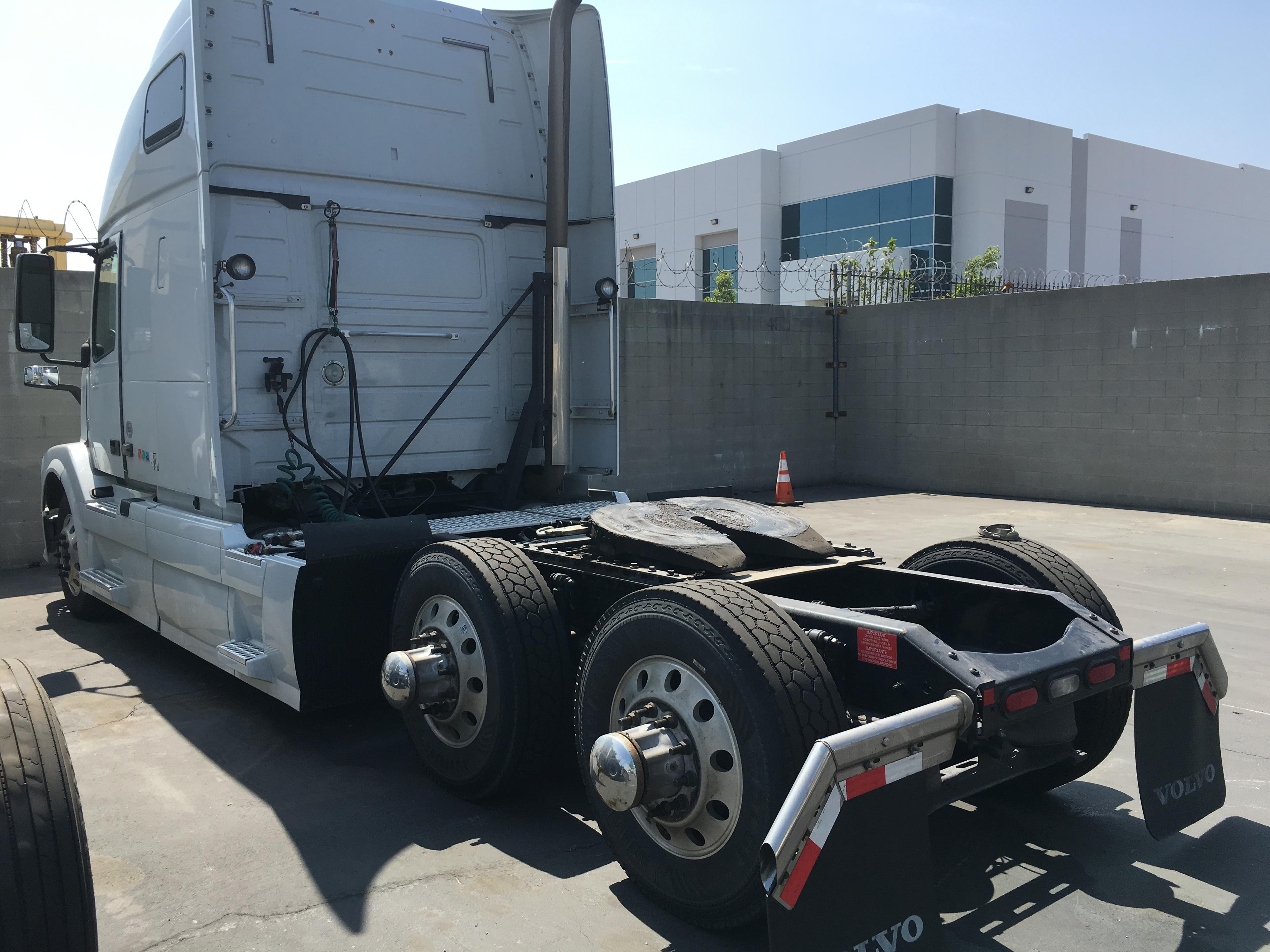 2015 Volvo VNL64T Tractor Truck, heavy duty, conventional cab, 6x4, 10 speed manual transmission, 12