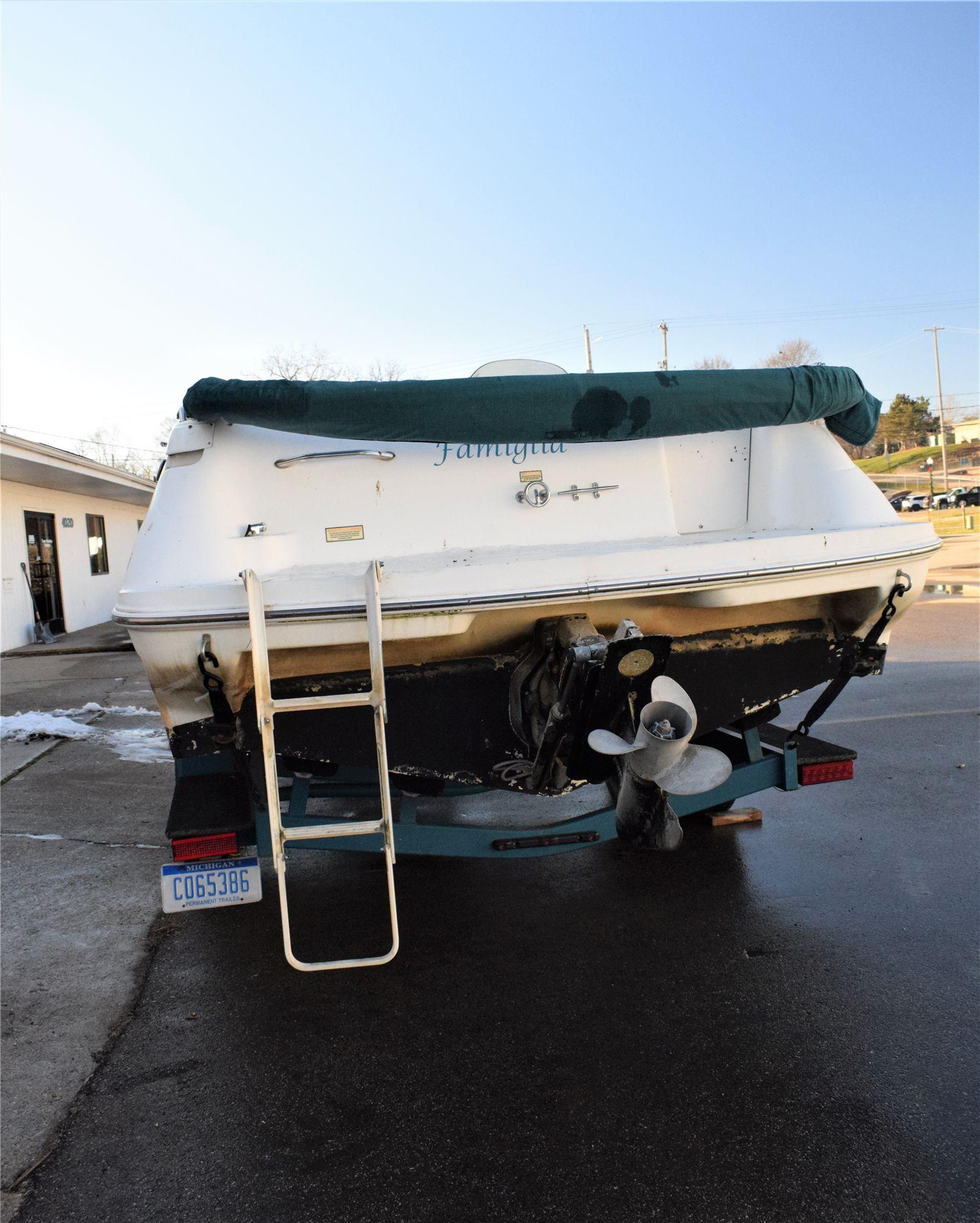 1998 Sea Ray Model: Sundeck 240. VIN:SERV6106E898. Hours: 550. This boat is located in Grand Rapids,