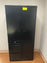 Metal cabinet with filing drawers