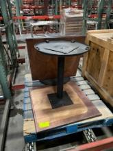 Square brown table on black pedestal, round base - one has detached top - 29.5"x29.5"x1"