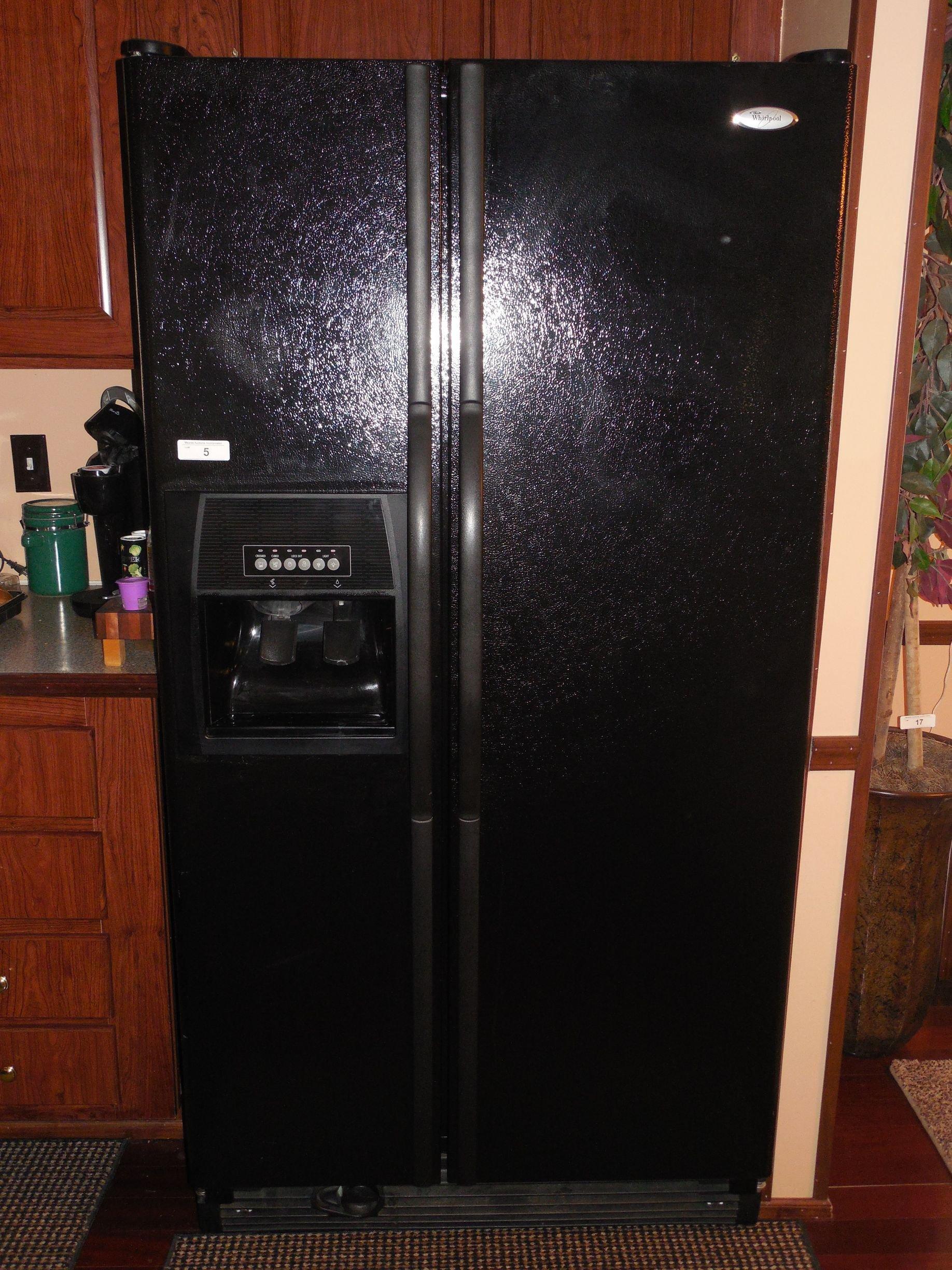 Black Side by Side Whirlpool Refrigerator.