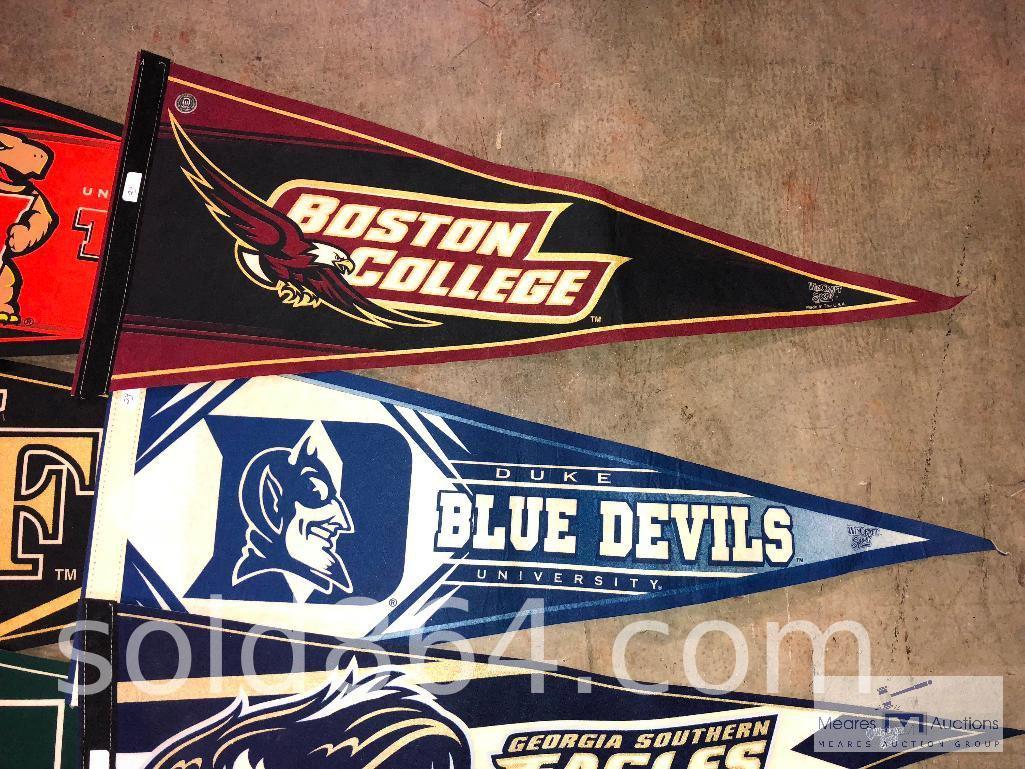 Large box of mixed college Pennants