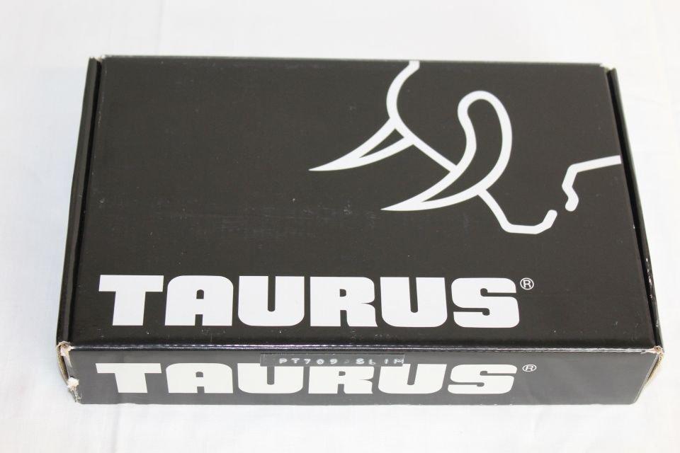 Taurus PT709 Slim 9mm Pistol w/2 7-Rd. Mags and Box.