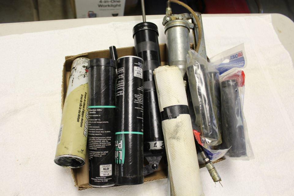 3 Grease Guns and Several Tubes of Grease.