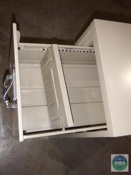 Two drawer metal file cabinet