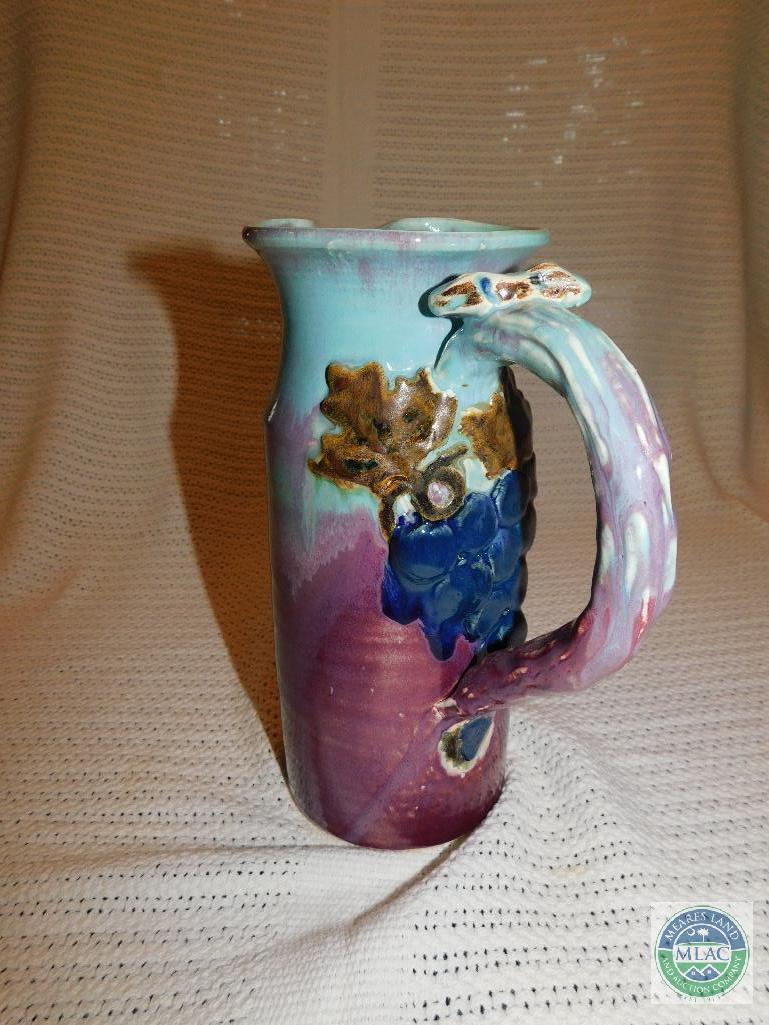 2 Pottery Grape Pitchers Signed "Grim 04"