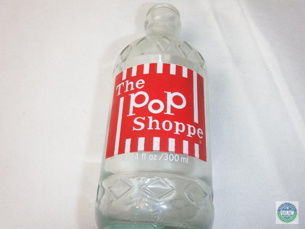 The Pop Shoppe 10 oz. Clear Glass Bottle Empty