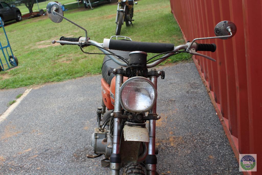 Orange Suzuki 90 motorcycle (with title)