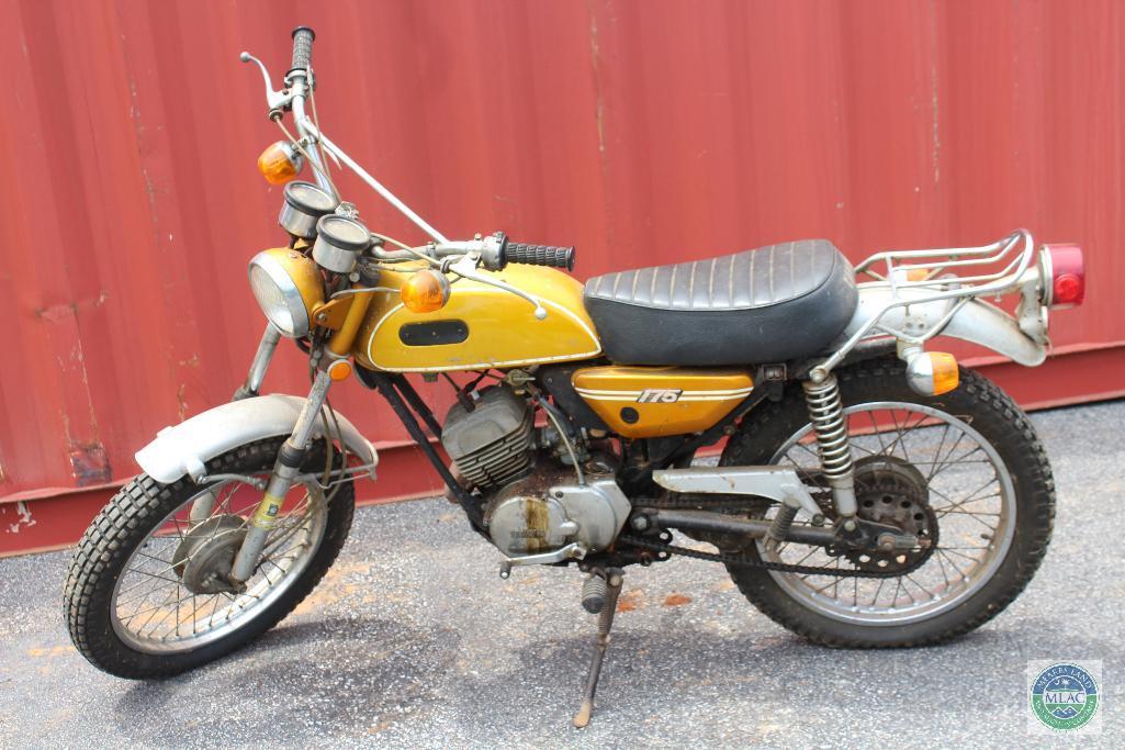 Gold Yamaha 175 motorcyle