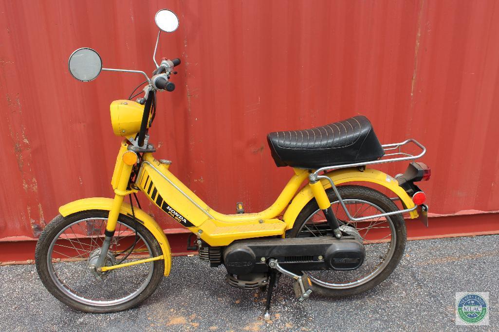 Yellow Honda PA50 moped (with title)