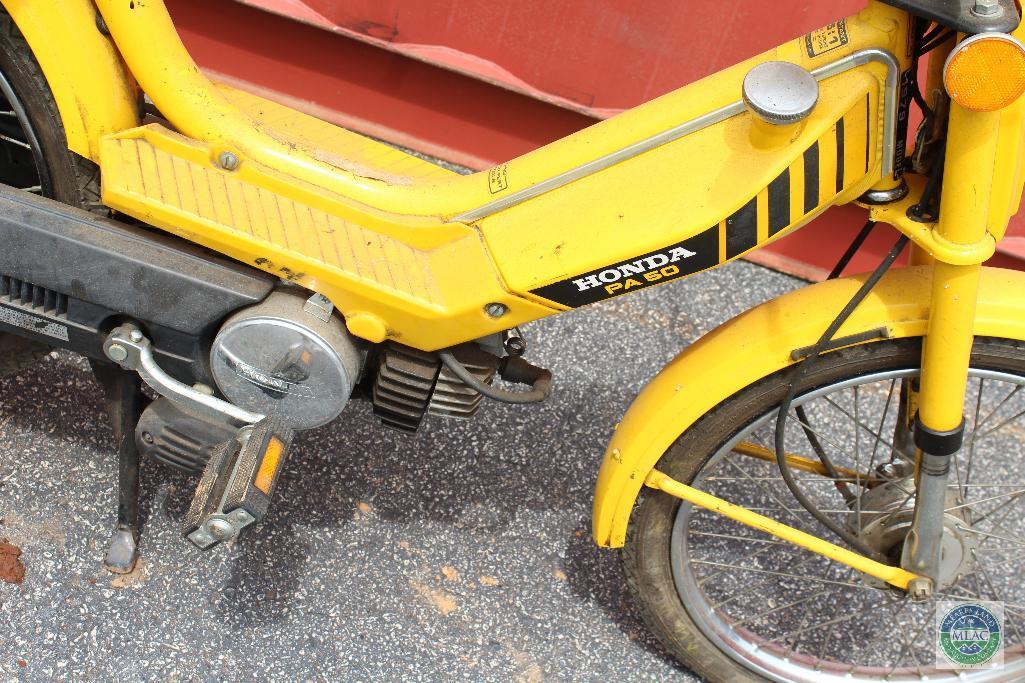 Yellow Honda PA50 moped (with title)