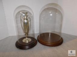 Lot 2 Round Glass Display Cases w/ Wood Base 1 Includes Silver Tone Trophy