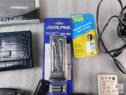 Lot of Electronic Items Remotes, Cell Phone, Cases, and Power Cords