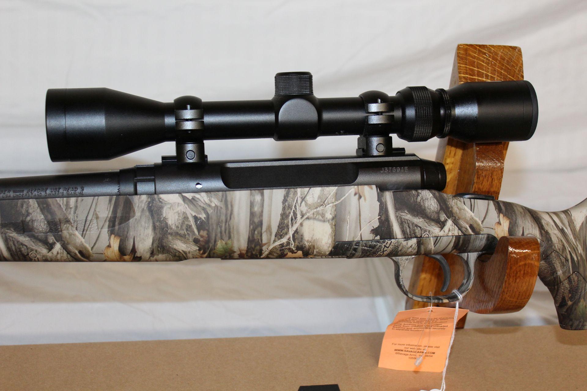 Savage Axis .22-250 REM Bolt Action Rifle in Camo w/Scope.