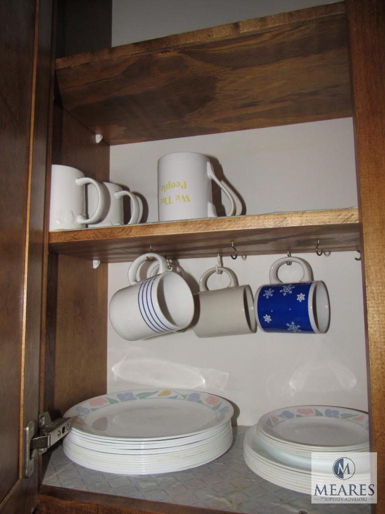Contents of kitchen cabinets includes china mugs plates bowls and saucers