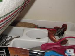 Contents of kitchen cabinets includes rival toaster wooden Bowl pot holders Plus