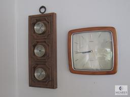 Contents of sunroom walls includes clock, weather gauge, and pictures