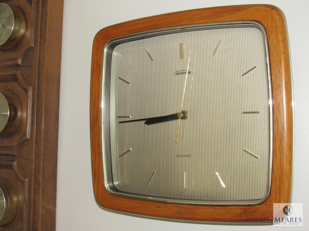 Contents of sunroom walls includes clock, weather gauge, and pictures