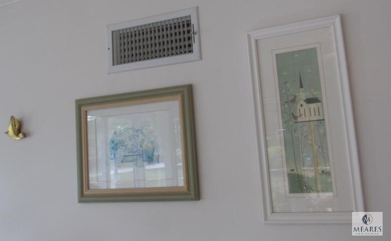 Contents of sunroom walls includes clock, weather gauge, and pictures