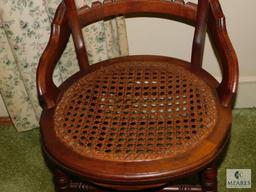 Vintage wood carved cane bottom chair