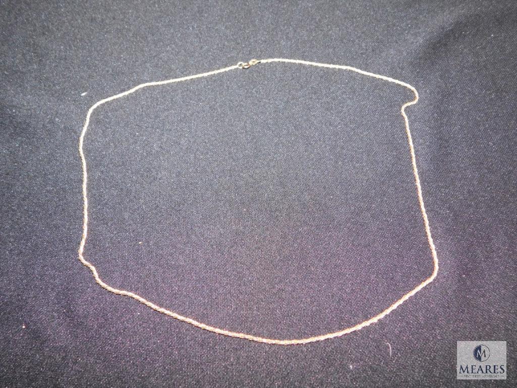 Necklace marked "750" on clasp ring (18k)