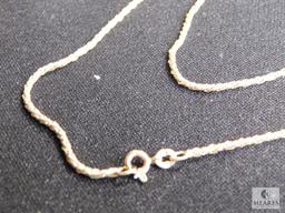 Necklace marked "750" on clasp ring (18k)