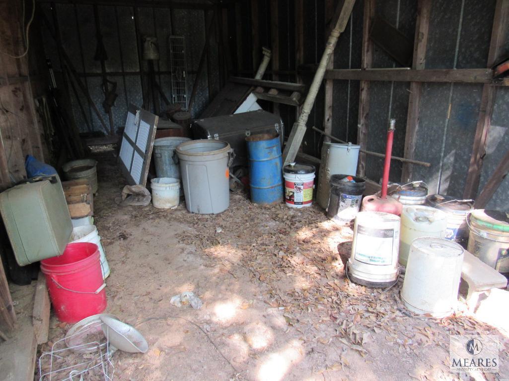 Contents Bldg#4 - Old Kerosene Heaters, Buckets, Old Trunk, Suitcase, Rear Axle, Chevy truck Grill,