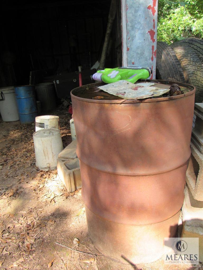 Contents Bldg#4 - Old Kerosene Heaters, Buckets, Old Trunk, Suitcase, Rear Axle, Chevy truck Grill,