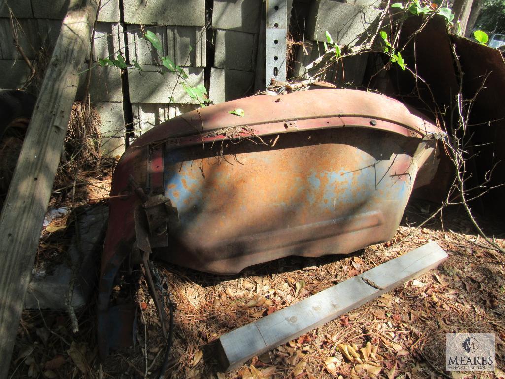 Lot yard Contents- Old truck fender, Tires & wheels, Cement Blocks, Black PVC pipe, metal scrap +