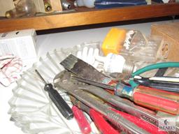 Cabinet lot - Lightbulbs, Glass Dish with Hand Tools +