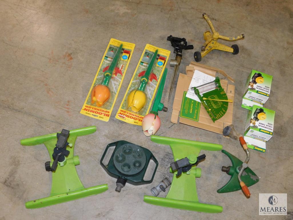 Lot of Garden Sprinklers, Timers, and Gauge