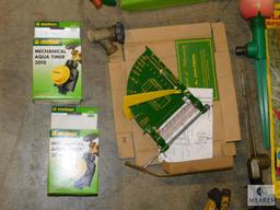 Lot of Garden Sprinklers, Timers, and Gauge