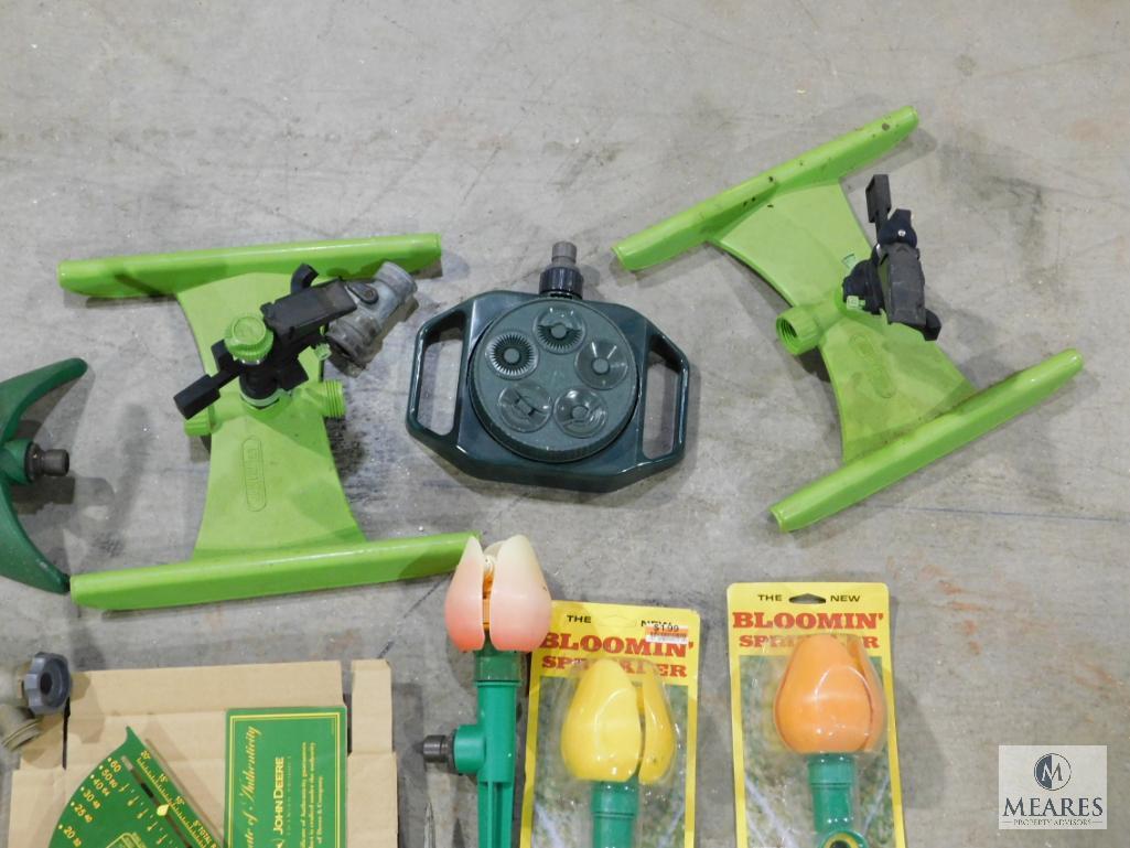 Lot of Garden Sprinklers, Timers, and Gauge